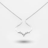 White gold necklace with a unique pendant on a white background