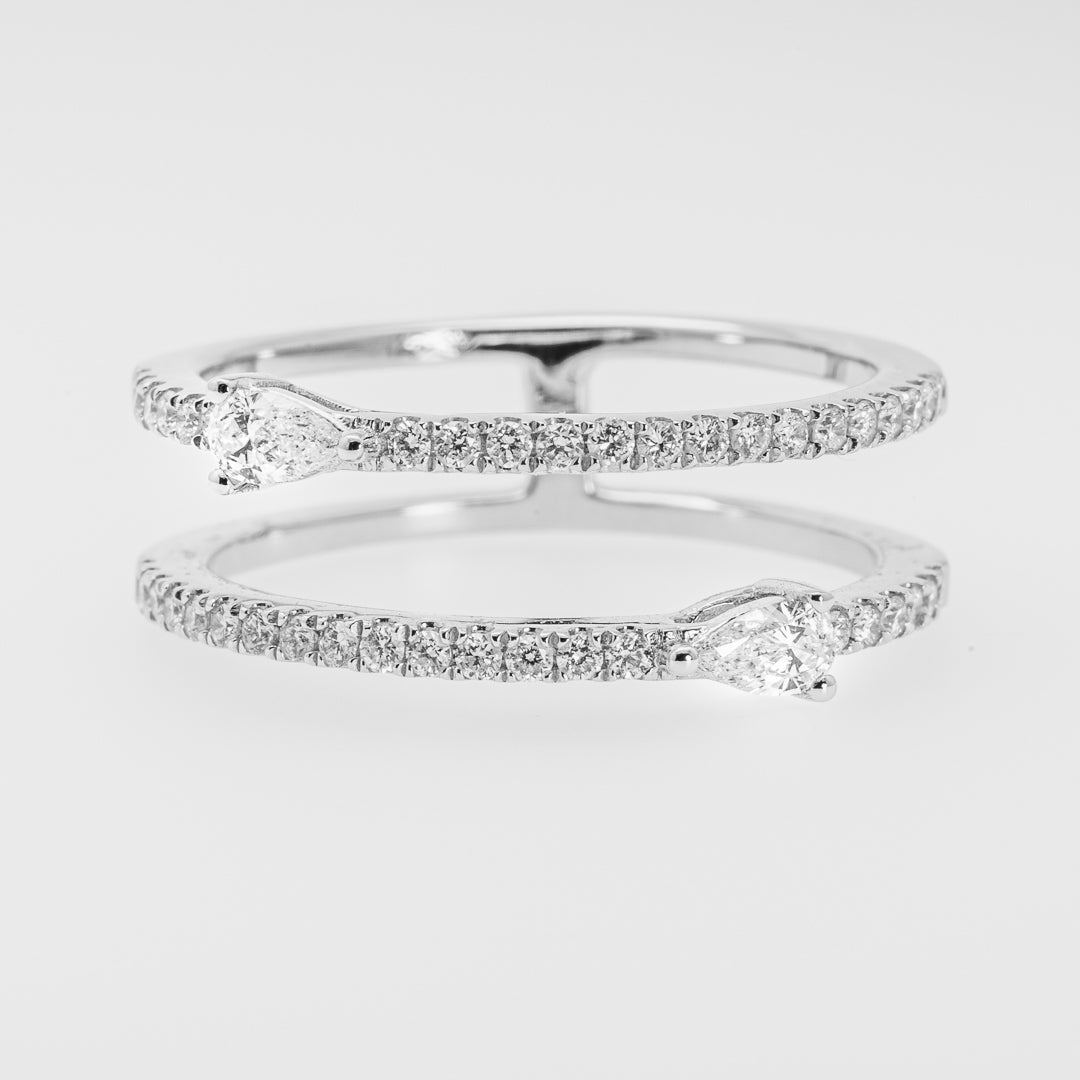 White gold double-band ring with small diamonds on a light gray background