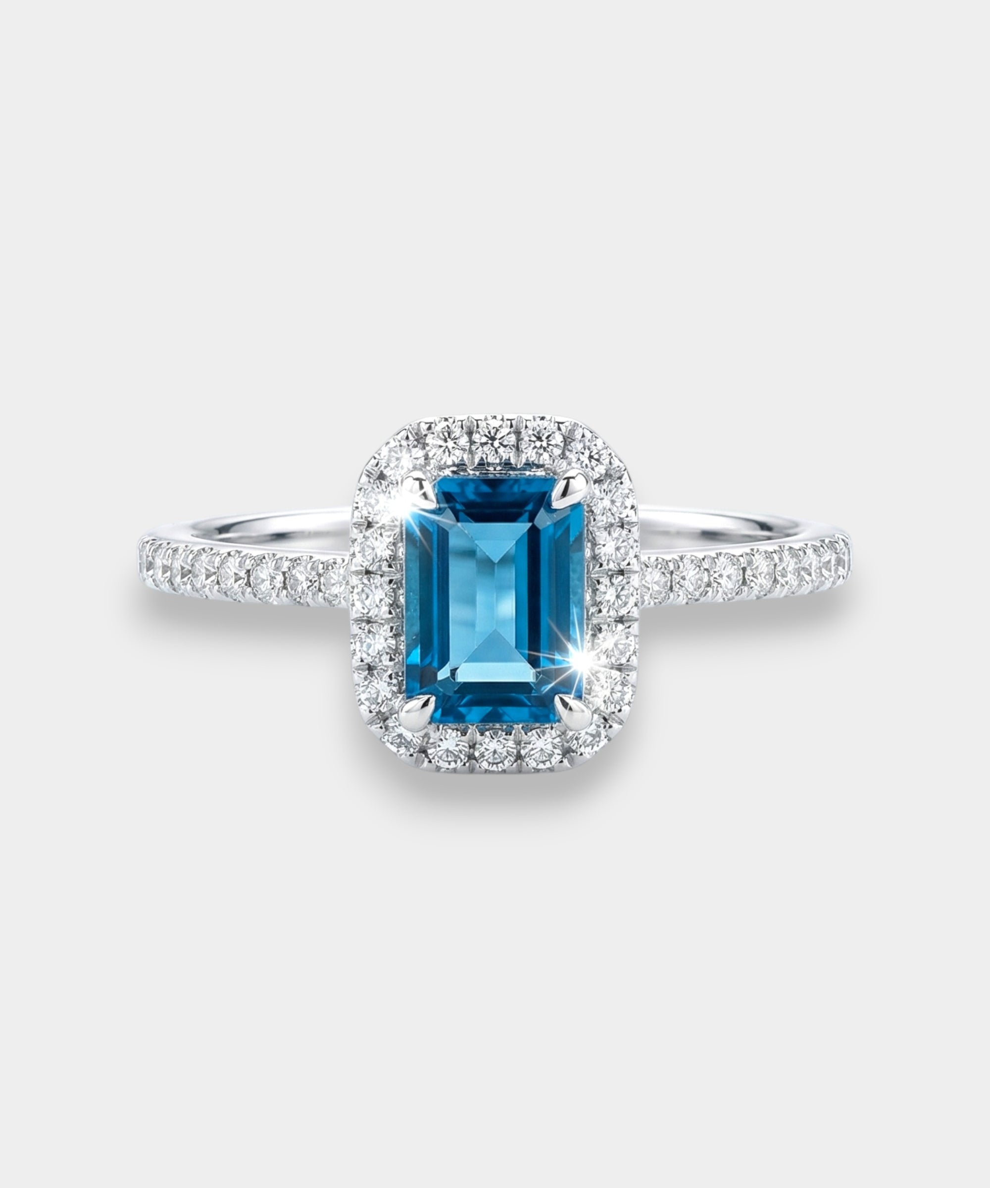 Ring with a topaz and diamond accents on a white background