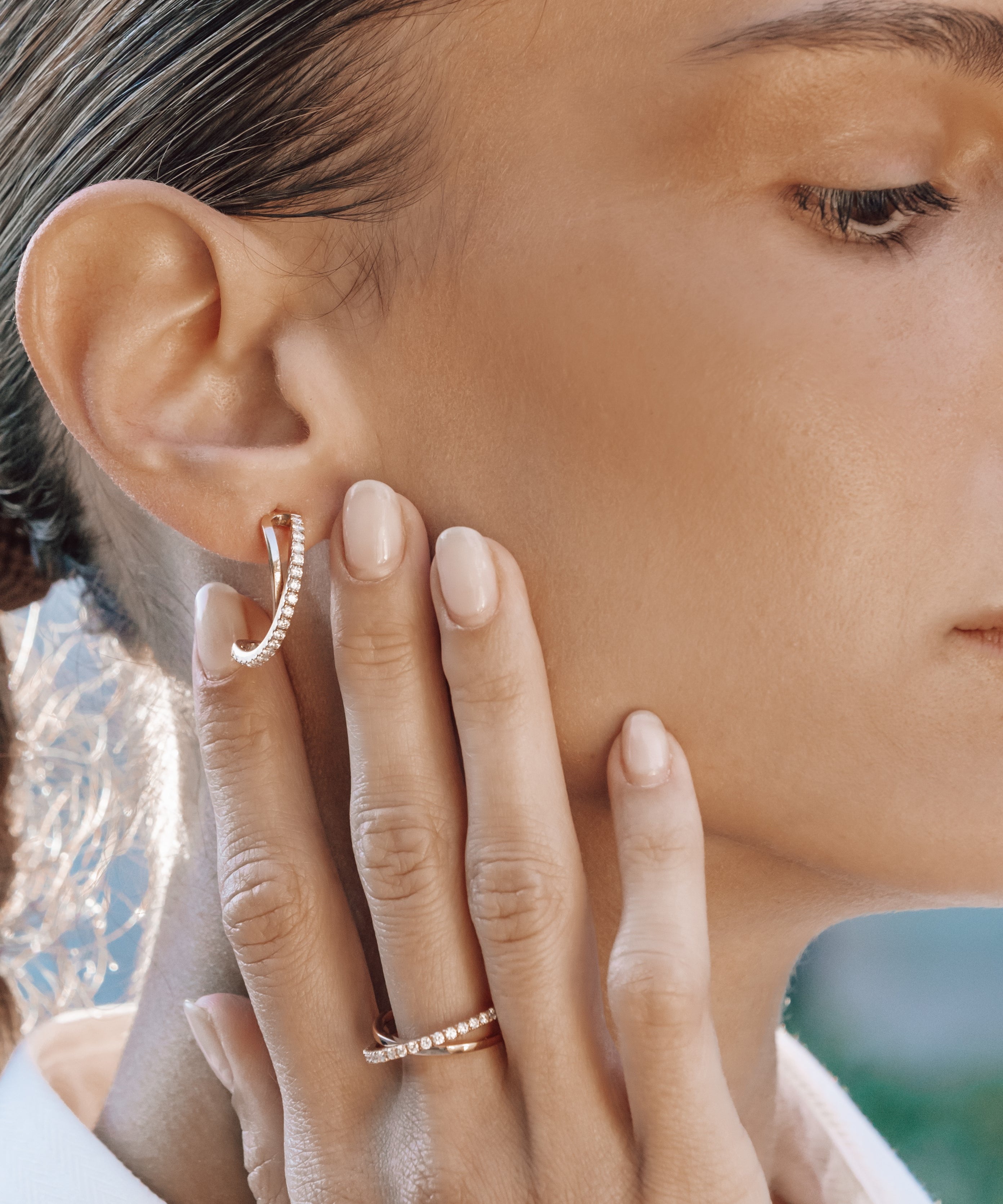 model sideview Gold Diamond Crossover Hoops 18K with Diamonds