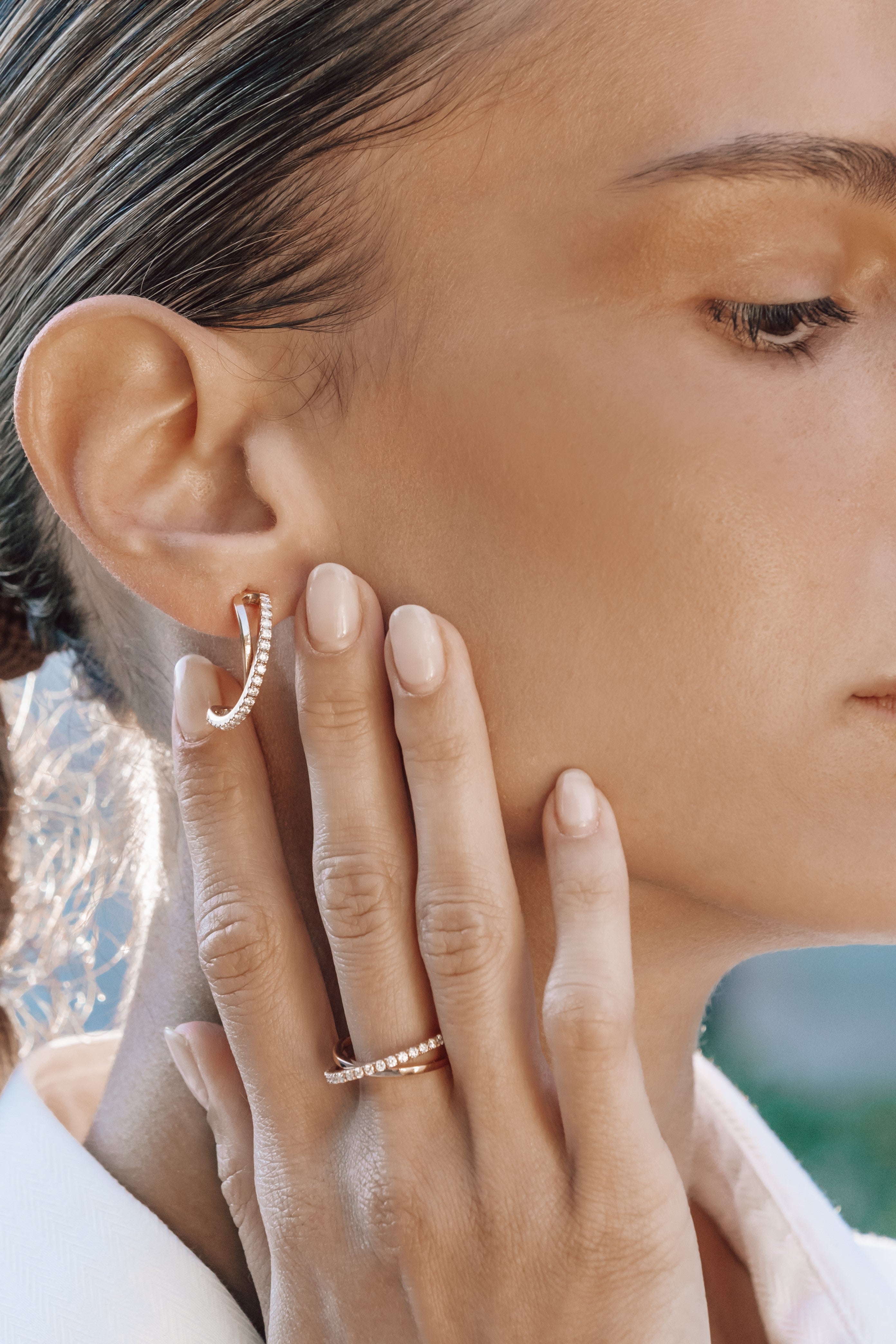 model sideview Gold Diamond Crossover Hoops 18K with Diamonds