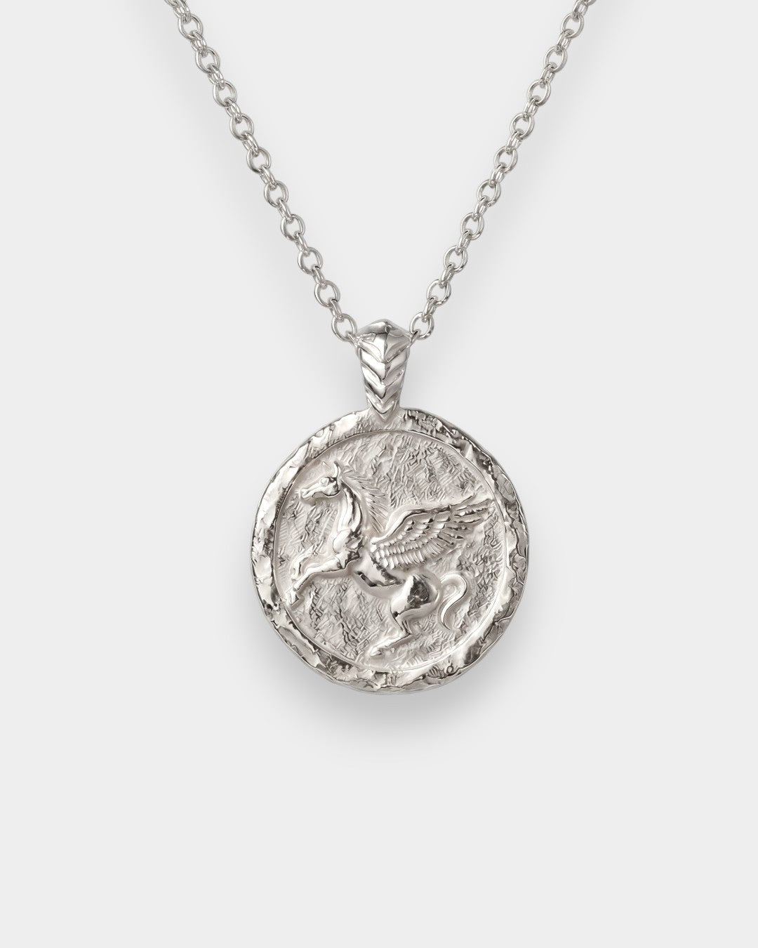 Silver pegasus pendant necklace with a chain on a white background