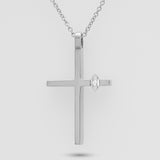 White gold cross pendant with a diamond on a light gray background