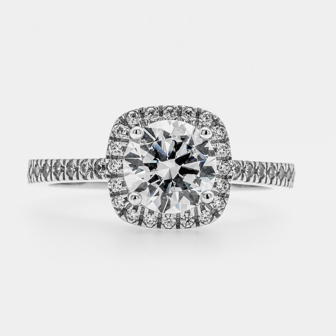 Diamond cushion-shaped ring with a white background