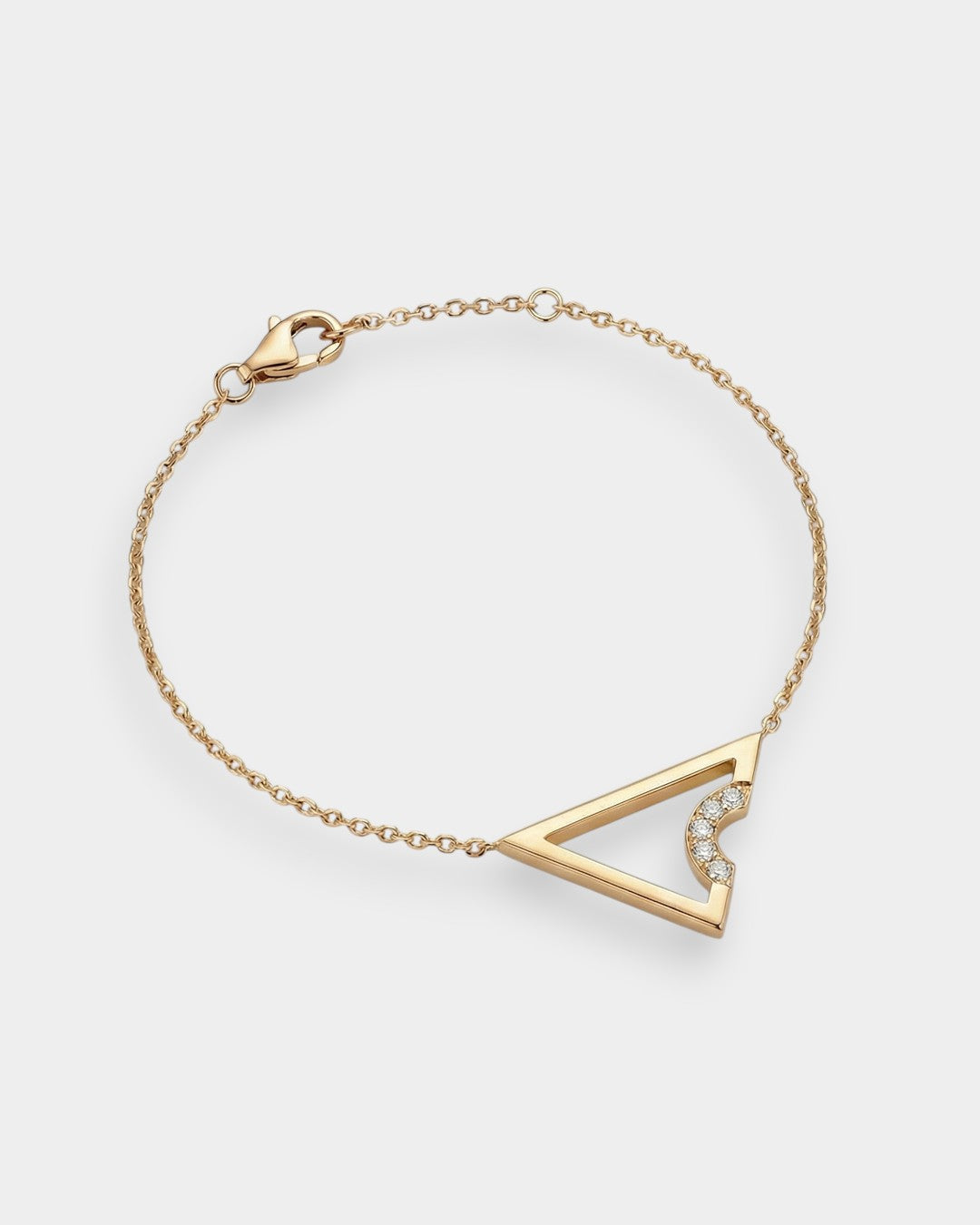 Gold bracelet with a triangle design on a white background