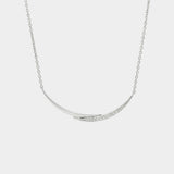white gold with diamonds necklace with a curved pendant on a light gray background