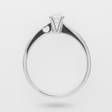 White ring with a diamond and a heart on the shank on a light gray background