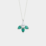 Diamond and emerald necklace on a white background