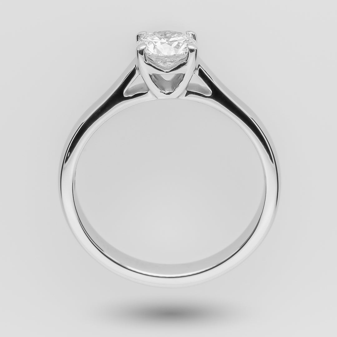 Diamond ring on a light gray background
