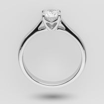 Diamond ring on a light gray background