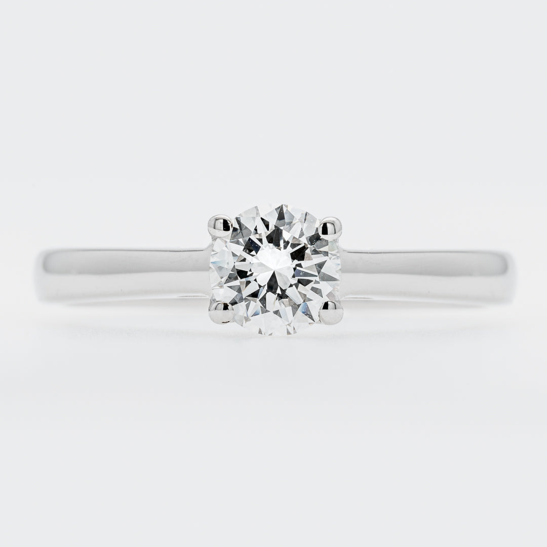 Diamond ring on a light gray background
