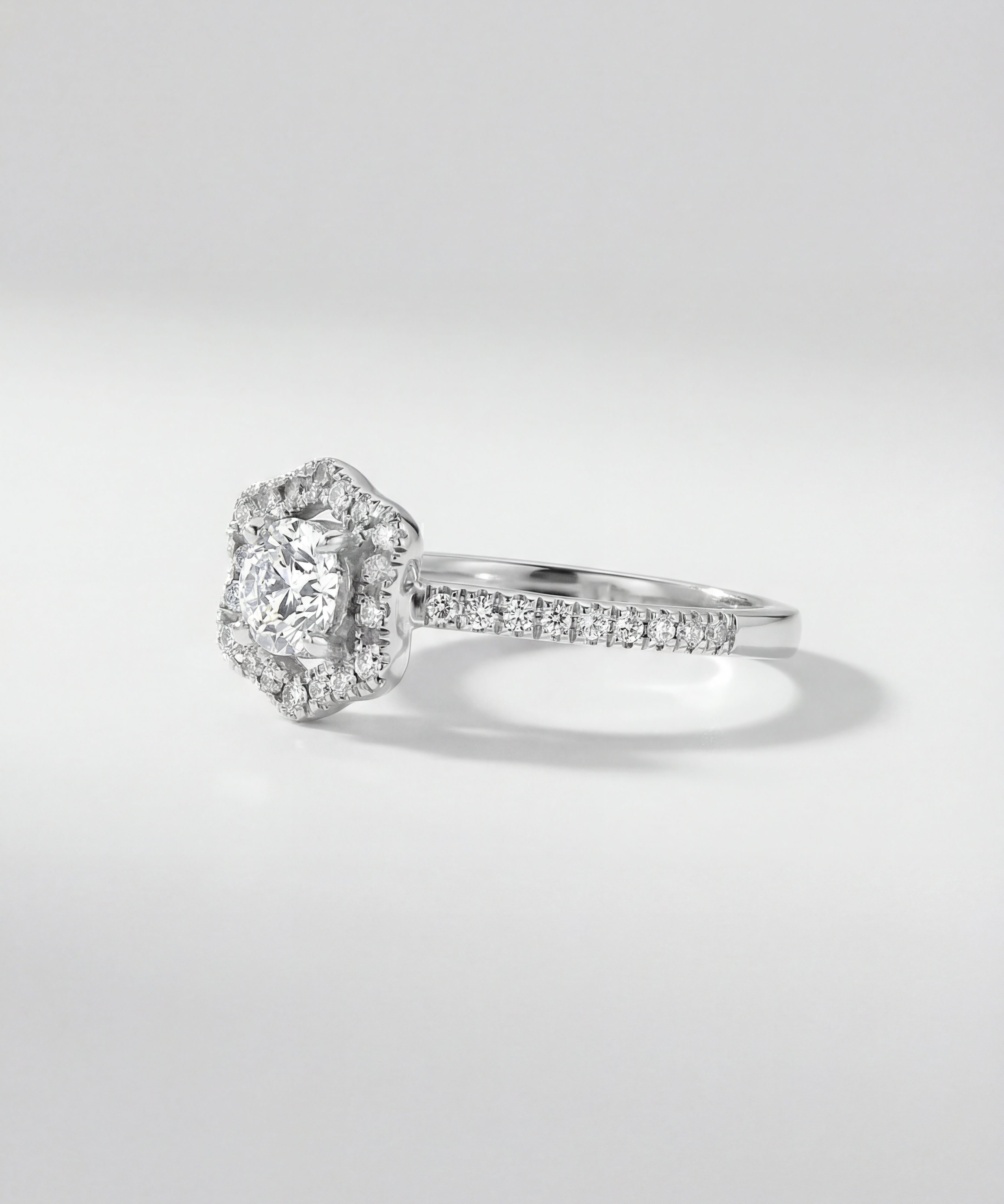 Diamond ring on a light gray background