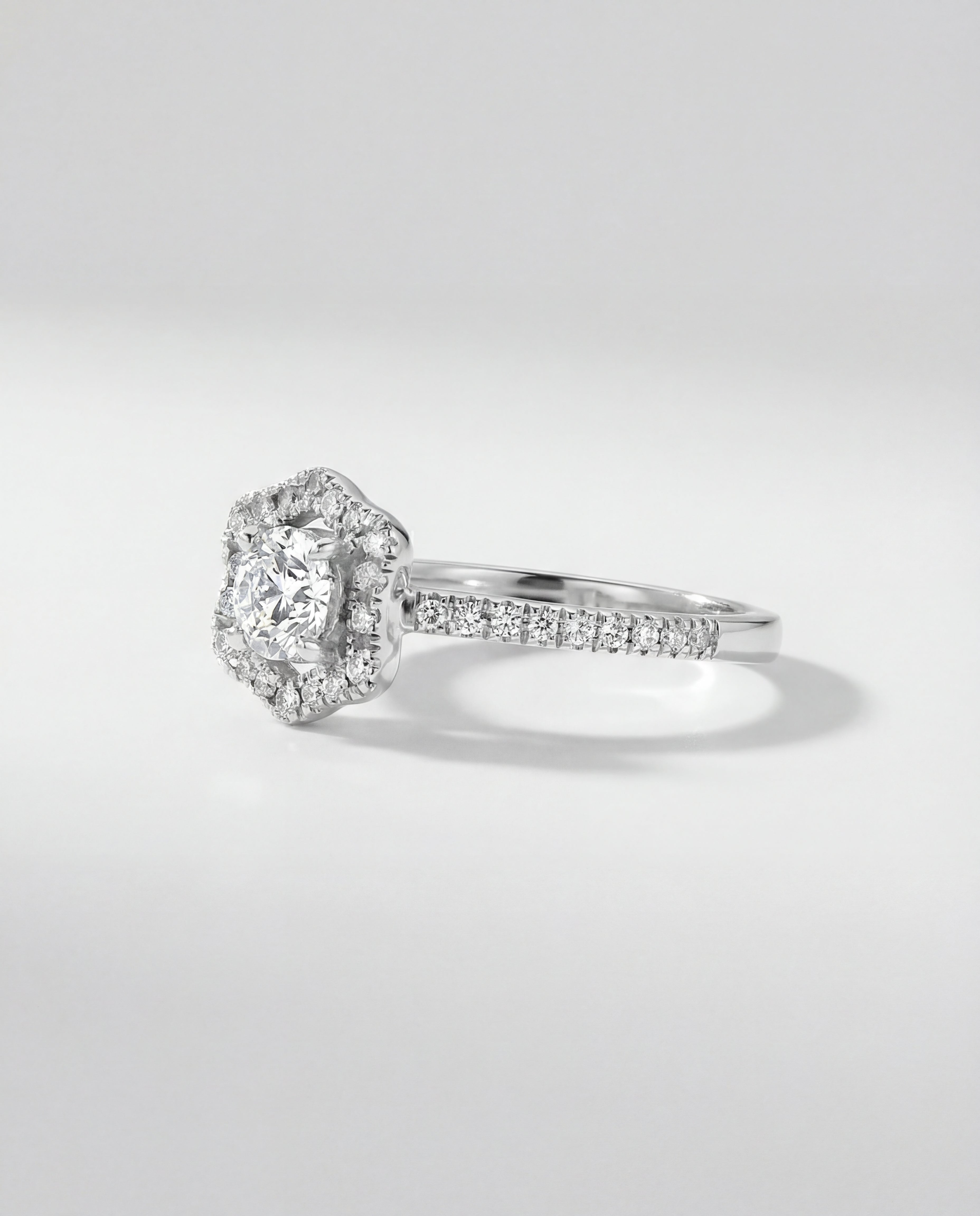 Diamond ring on a light gray background