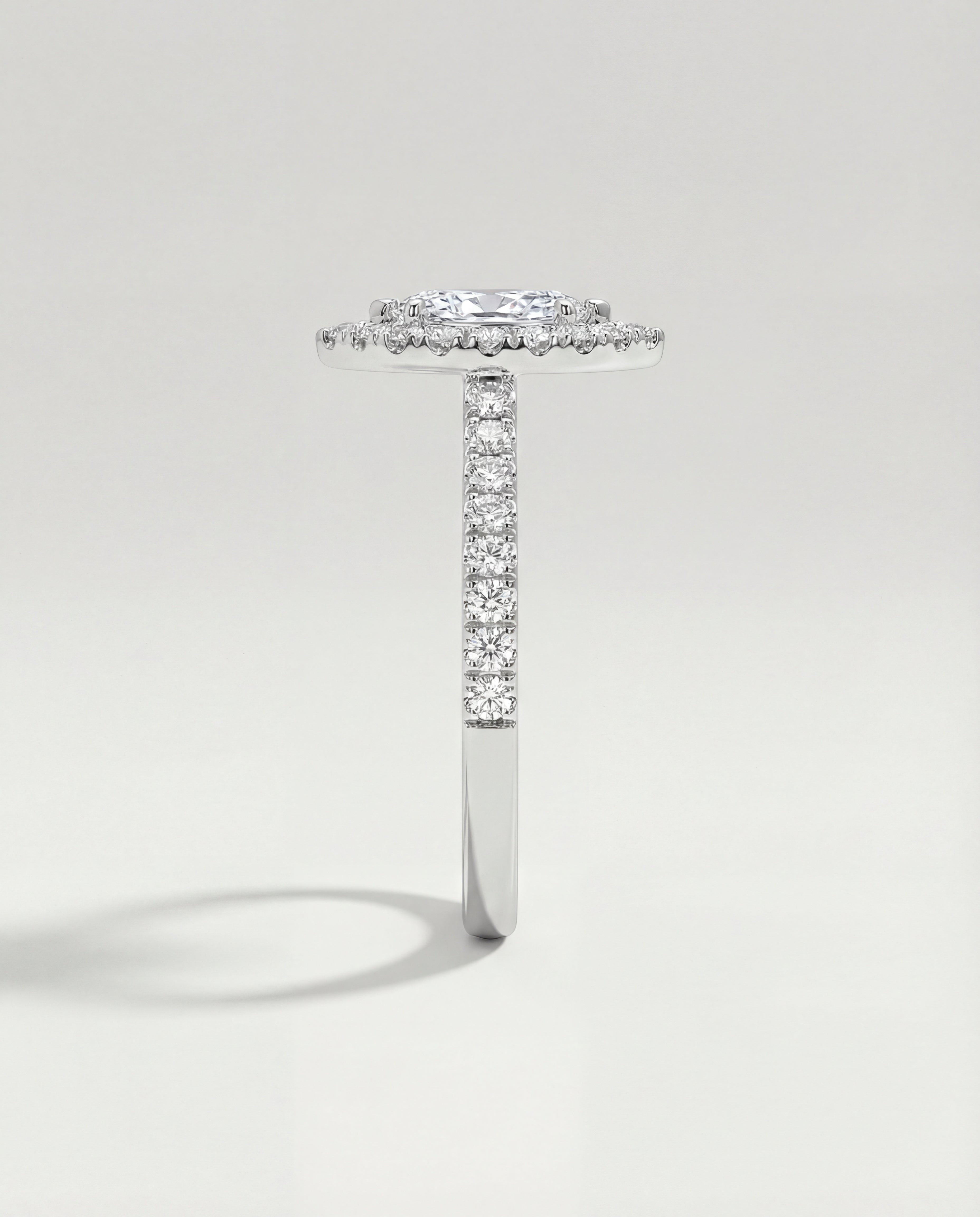 Diamond ring with a unique design on a light gray background