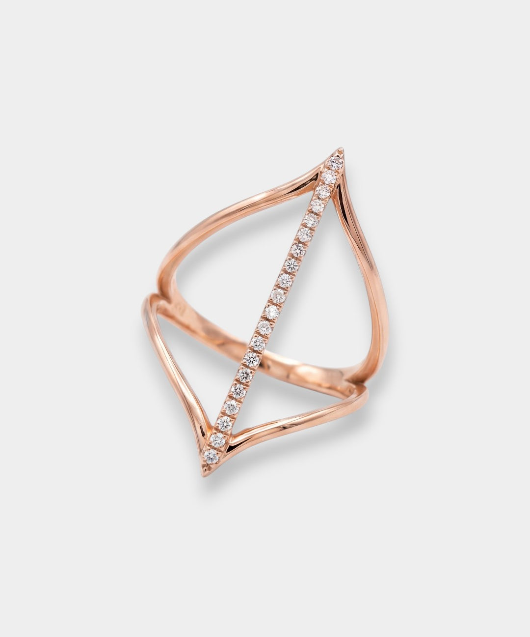 Rose gold ring with diamond accents on a light gray background
