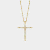 Gold cross necklace with diamonds on a white background