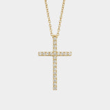 Gold cross necklace with diamonds on a white background