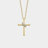 Gold cross necklace with embedded diamonds on a white background