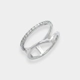 White gold ring with diamonds on a light gray background
