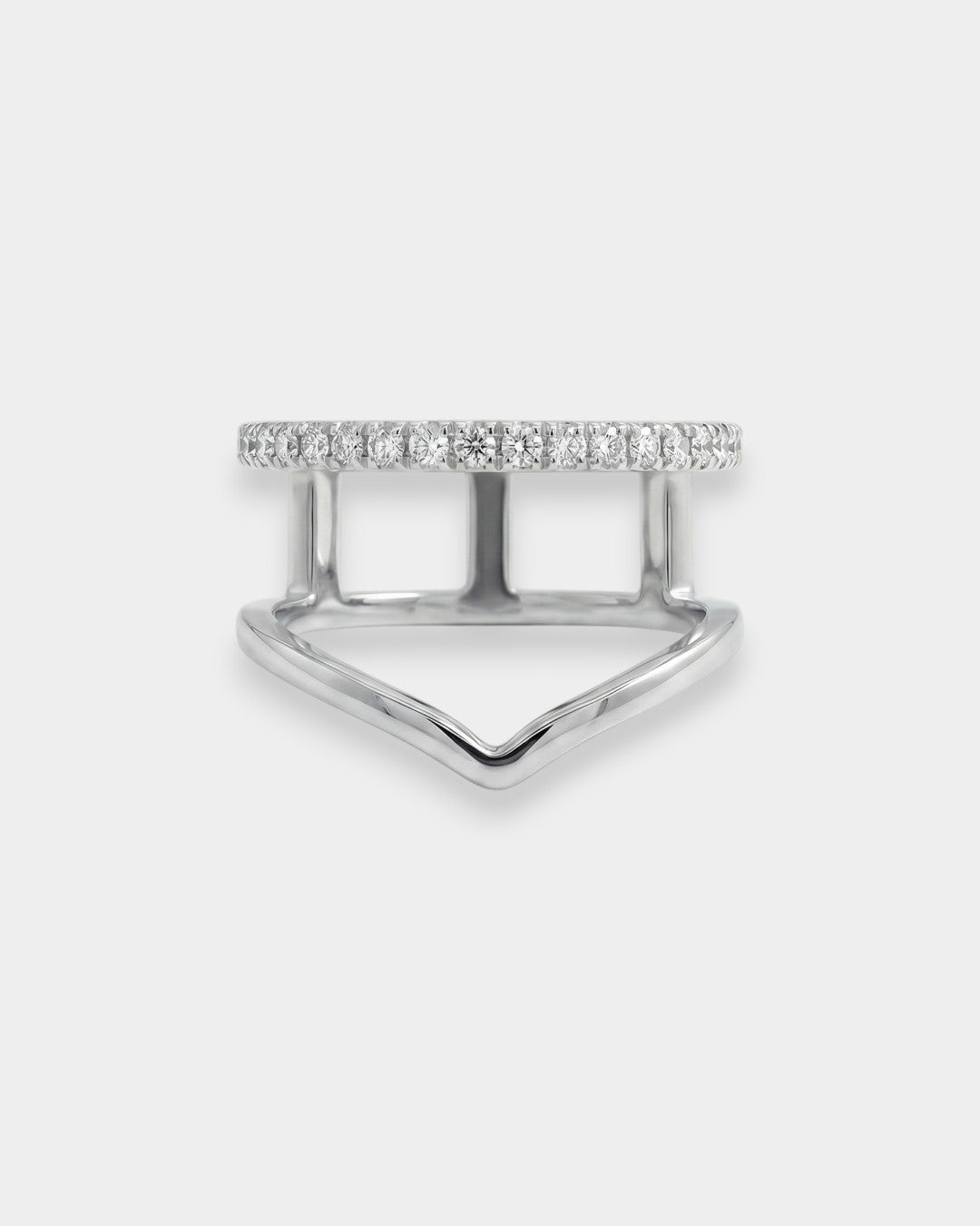 White gold ring with diamonds on a light gray background