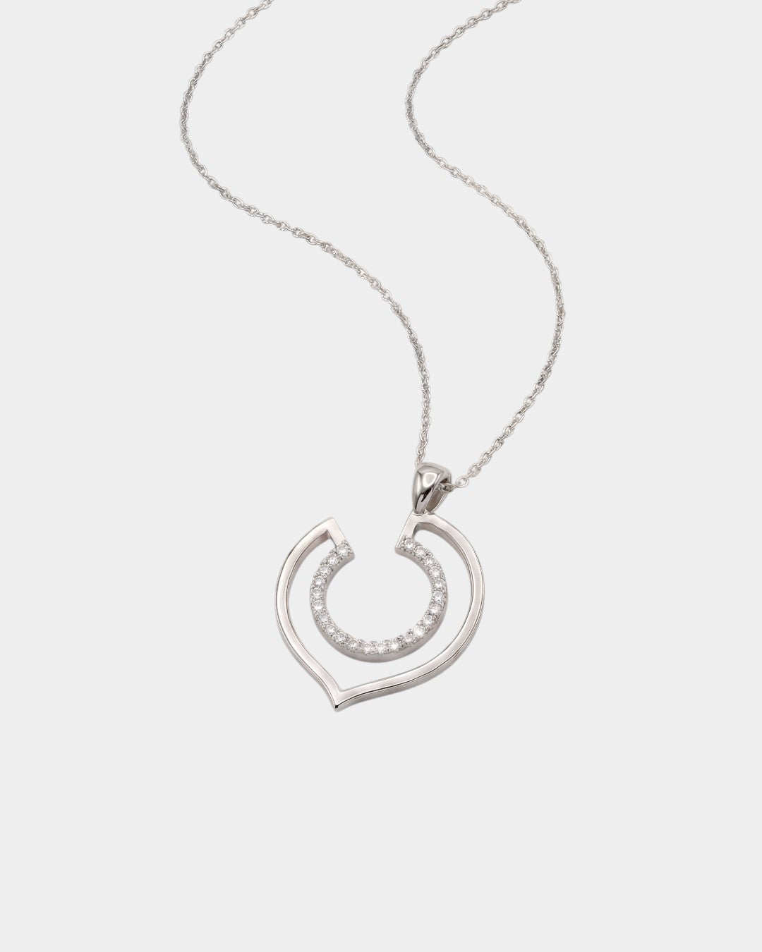 White gold necklace with a geometric-shaped pendant on a white background