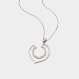 White gold necklace with a geometric-shaped pendant on a white background
