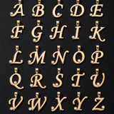 Gold letter pendants from A to Z on a black background