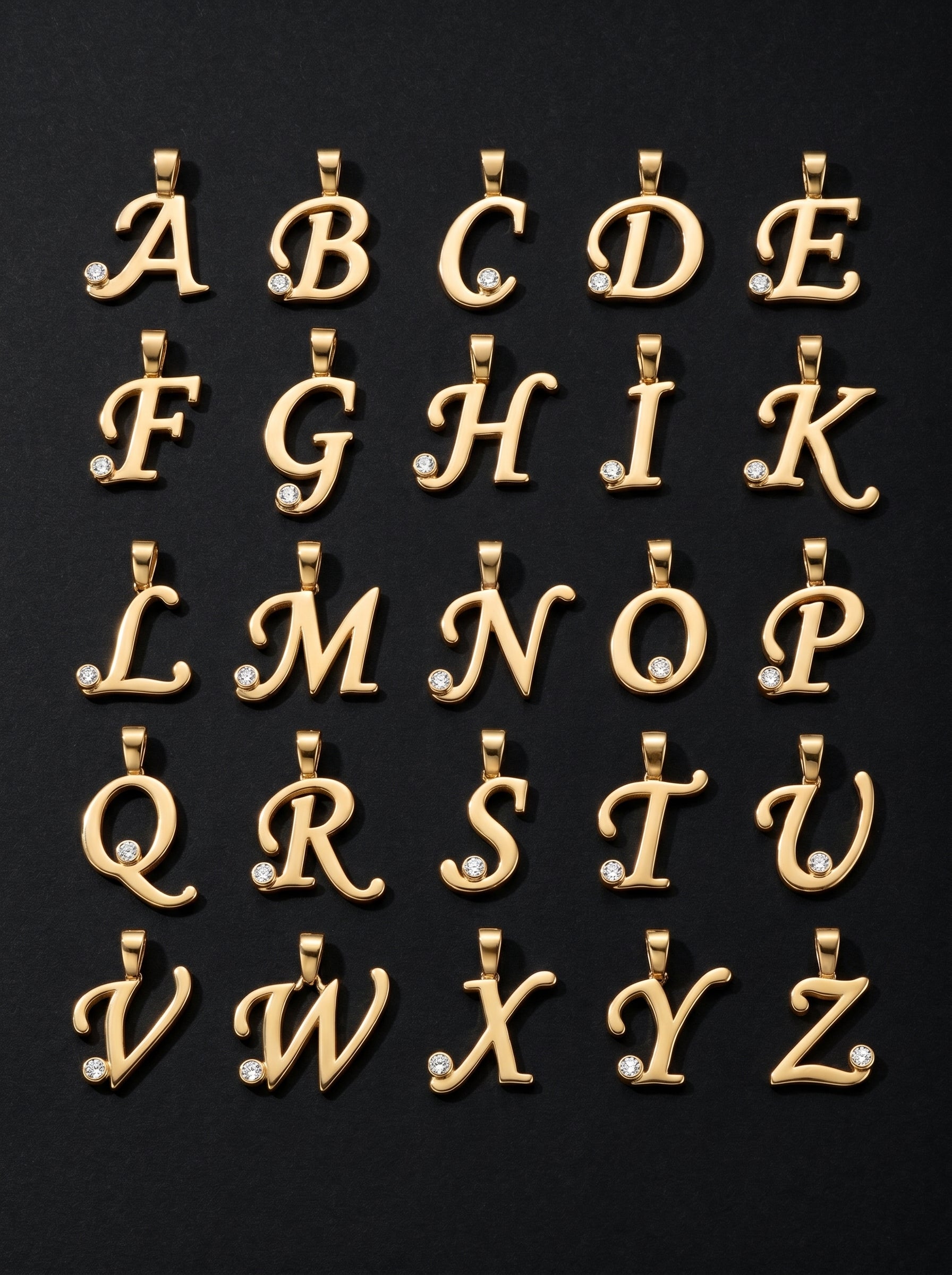 Gold letter pendants from A to Z on a black background