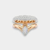 Bypass rings with diamond accents on a light gray background