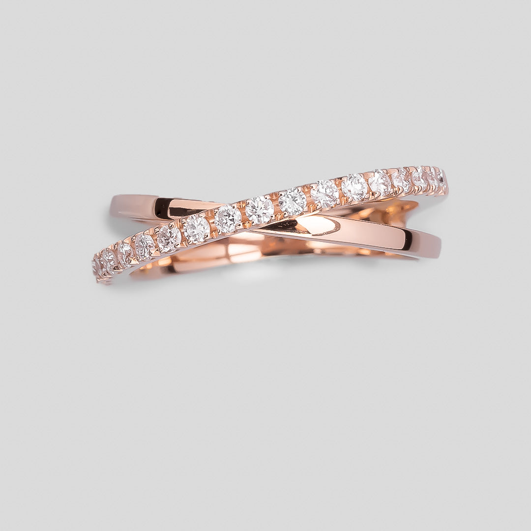 18k rose gold and diamond crossover ring by papadopoulos jewellery