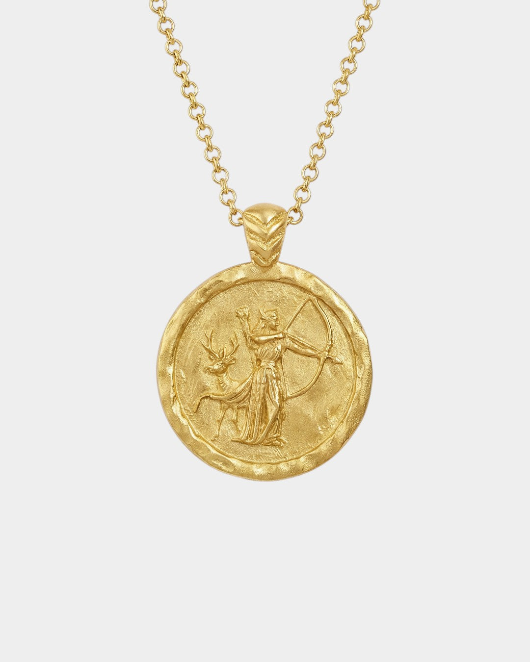 Gold necklace with a circular pendant featuring an artemis figure and deer on a white background