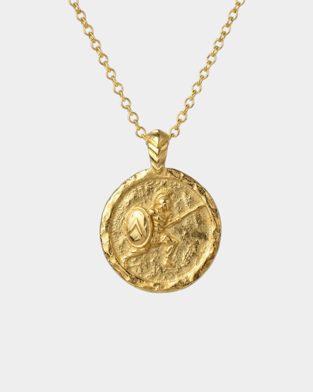 Gold necklace with a round pendant featuring a Spartan soldier on a white background