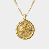 Gold necklace with a round pendant featuring a Spartan soldier on a white background