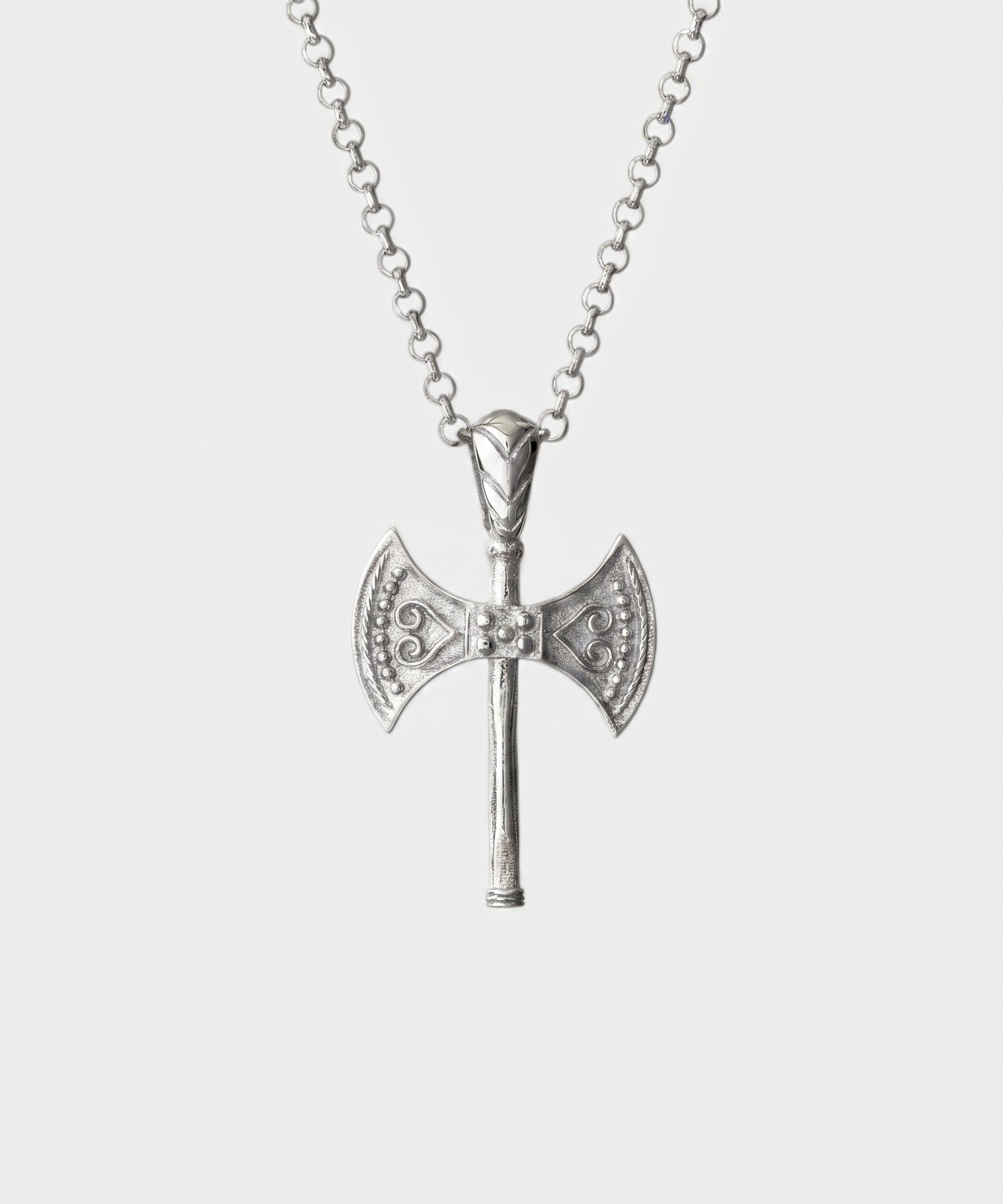 Silver axe-shaped pendant on a chain against a white background