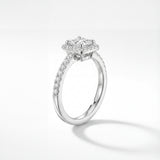 Engagement ring with a princess-cut diamond on a white background