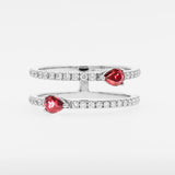 White gold rings with red rubies on a white background