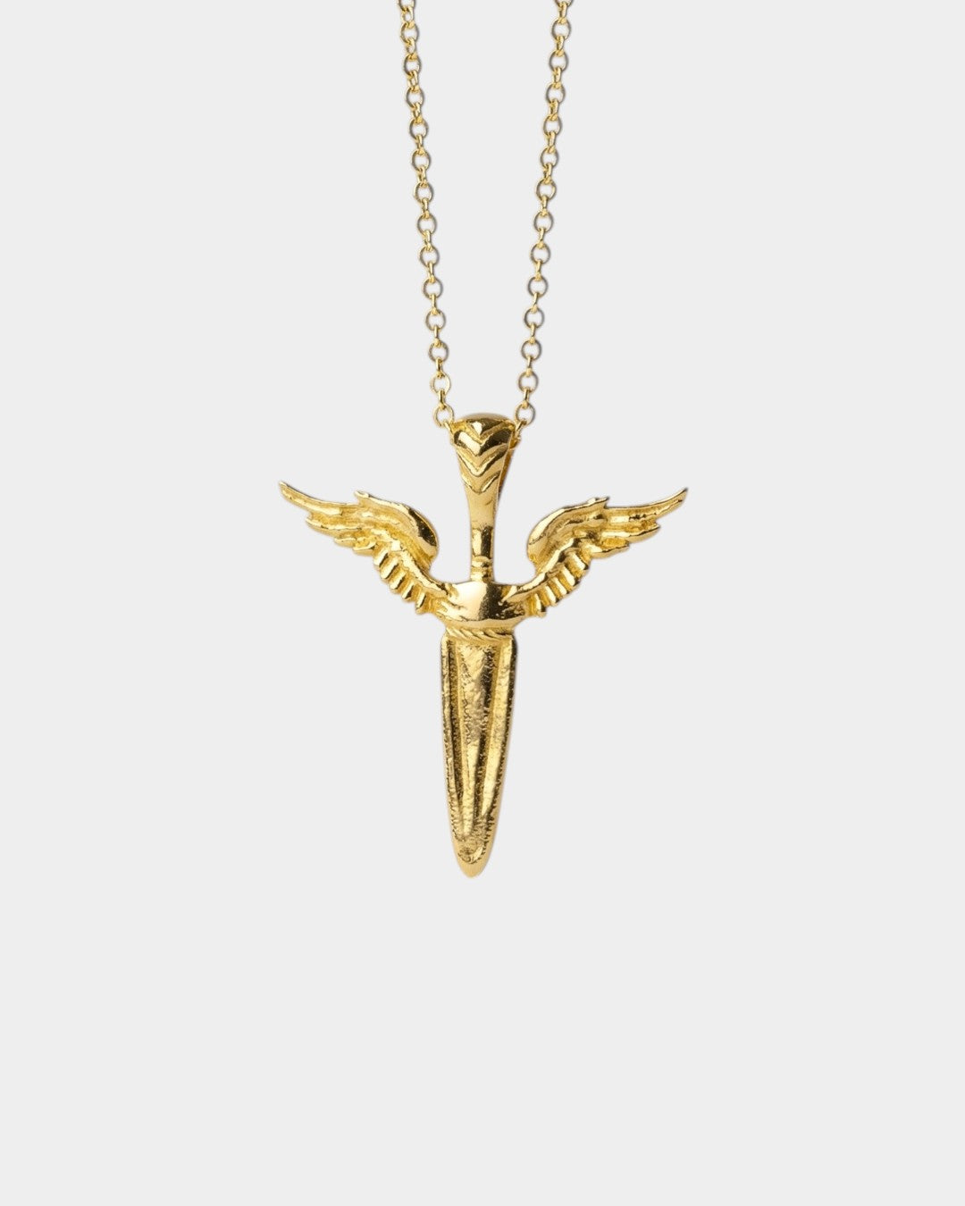 Gold necklace with a winged pendant on a white background