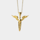 Gold necklace with a winged pendant on a white background